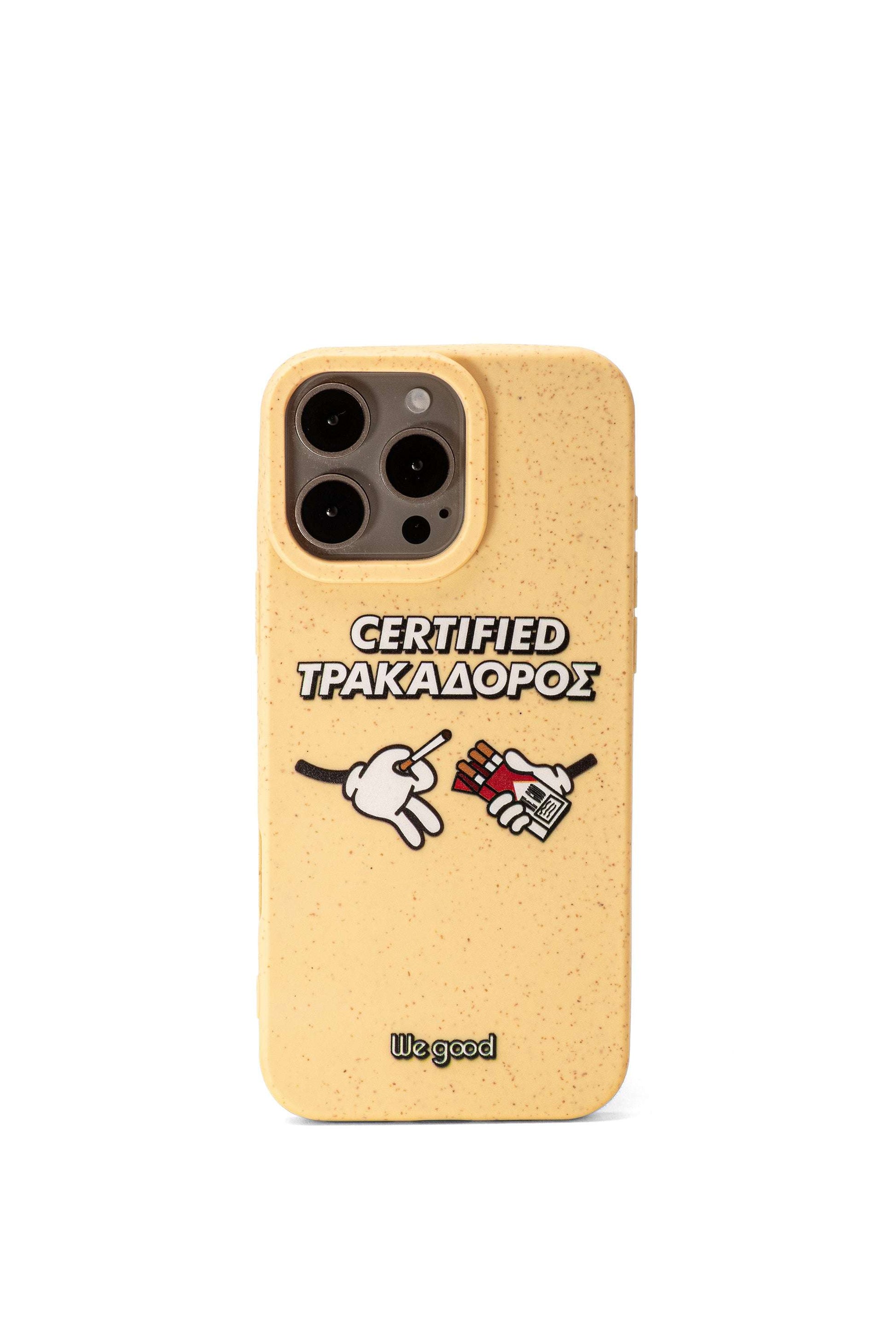 We Good Tpu iPhone case with wheat mix speckled in a canary yellow color with 'certified trakadoros' white and black bold text print and below it two cartoon hands with white gloves with one holding a red pack of cigarettes and the other hand taking one from the pack.